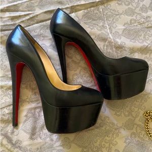 Christian Louboutins (red bottoms)